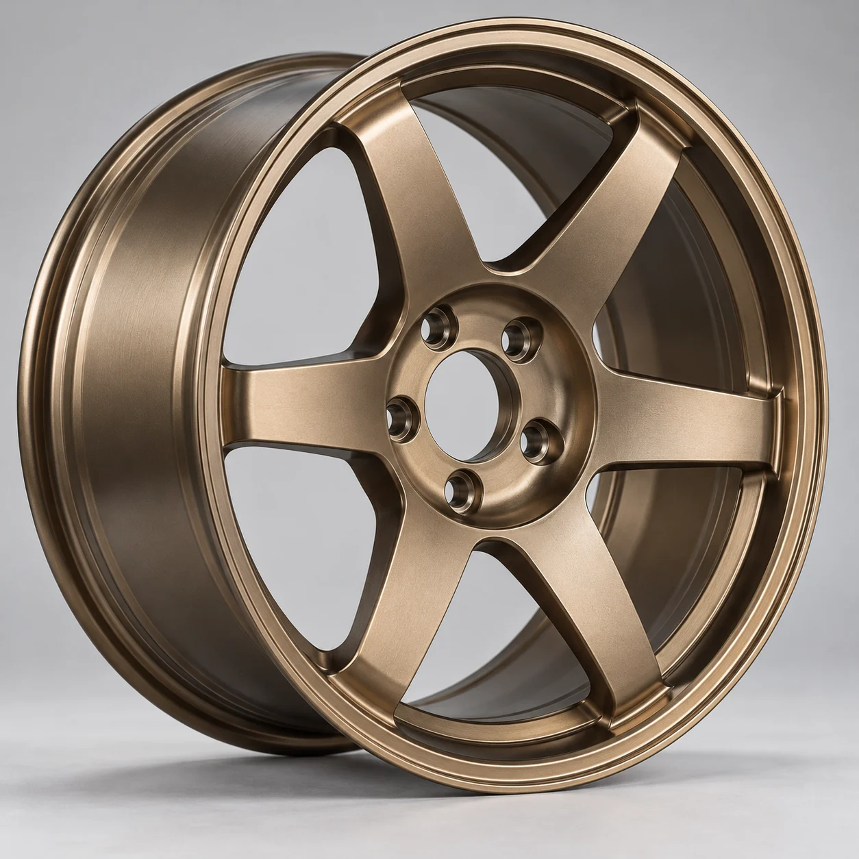 Illustrative straight 6-spoke concave forged aluminum wheel in satin bronze, studio shot